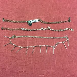 Multiple gold bracelets